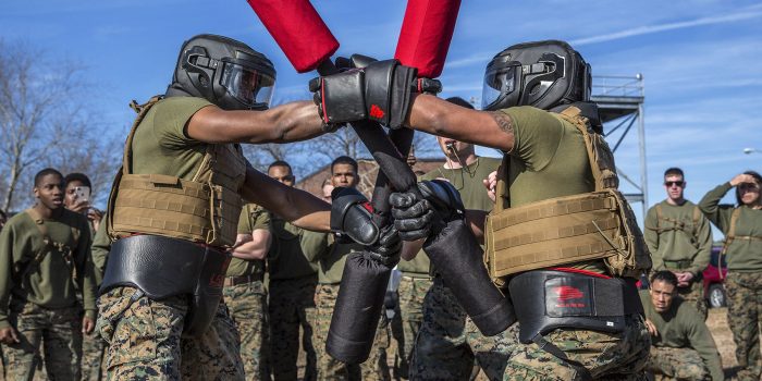 U.S. Marines with Marine Wing Communication Squadron (MWCS) 28 compete in a pugil stick match during the Spartan Cup competition on Marine Corps Air Station Cherry Point, N.C., Feb. 9, 2018. The Spartan Cup is an MWCS-28 event held semiannually to give the Marines a chance to compete against one another while building camaraderie and unit cohesion. (U.S. Marine Corps photo by Cpl. Jonathan Wiederhold)